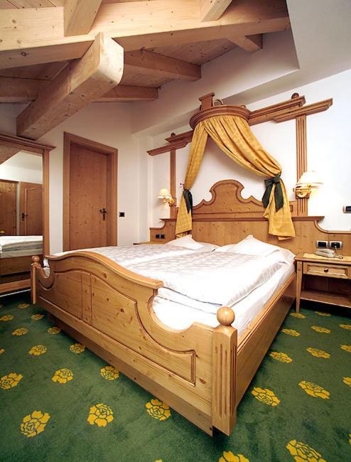 Hotel Flora Selva di Val Gardena Pokoj fotografie